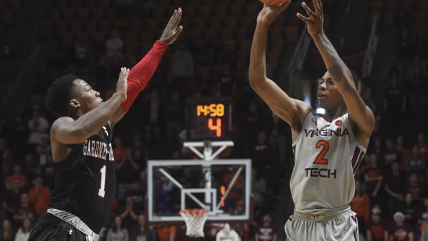 Dec 15, 2019; Blacksburg, VA, USA; Virginia Tech Hokies guard/forward Landers Nolley II (2) shoots over Gardner-Webb Runnin' Bulldogs point guard Jaheam Cornwall (1) in the second half at Cassell Coliseum. Mandatory Credit: Michael Shroyer-USA TODAY Sports